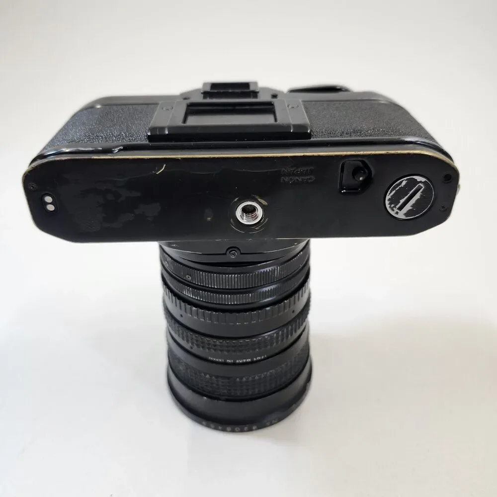 Canon AE-1 Black 35mm SLR Film Camera Sakar MC Zoom 1:3.5-4.5 f 28-80mm